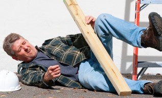 Injured construction worker fallen off ladder